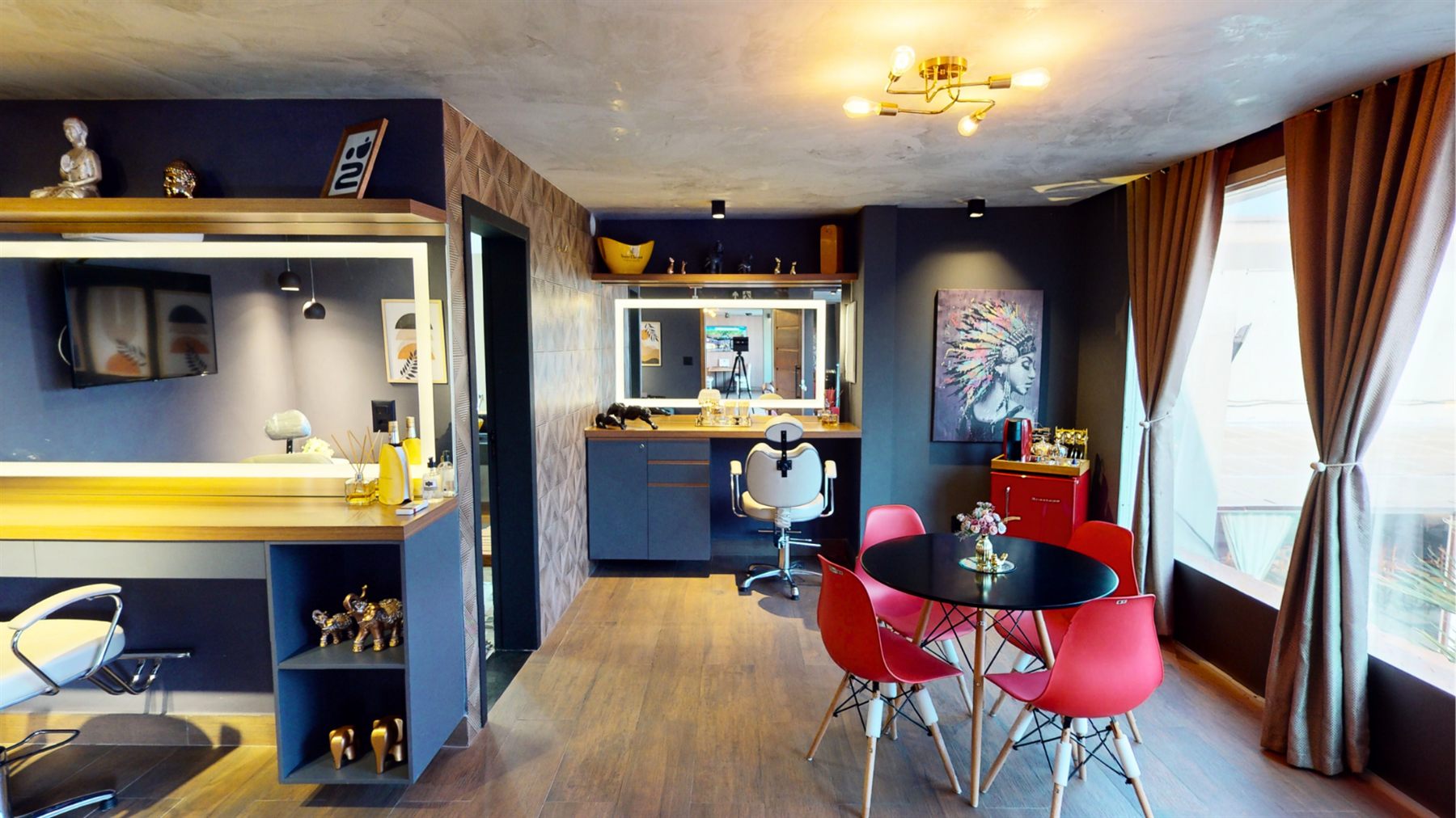 Camarim da noiva com penteadeira iluminada e área de estar